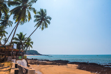 Tropical, sandy Anjuna Beach on the Goa coast, India
