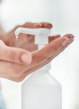 For hand sanitizer to be effective it must be used correctly. Cropped shot of an unrecognizable woman sanitising her hands.