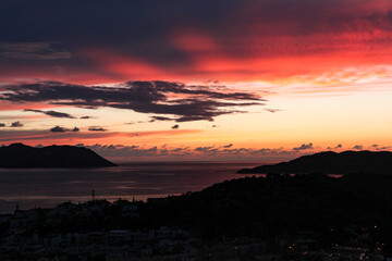 Beautiful sunset,
cloudy and extraordinary sunset in red and orange colors on the Mediterranean coast