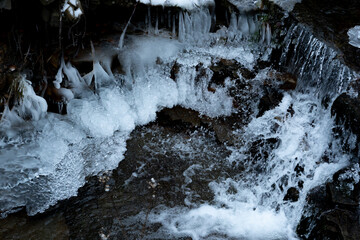 Wistula, Barania Góra, Beskidy, Poland.
Waterfall, cascades, icicles, ice, winter. - obrazy, fototapety, plakaty