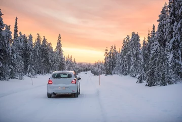 Rucksack Bad driving conditions on dangerous icy roads in slippery, ice and snow covered cold weather winter scenery in Lapland, Finland, Europe © Matthew