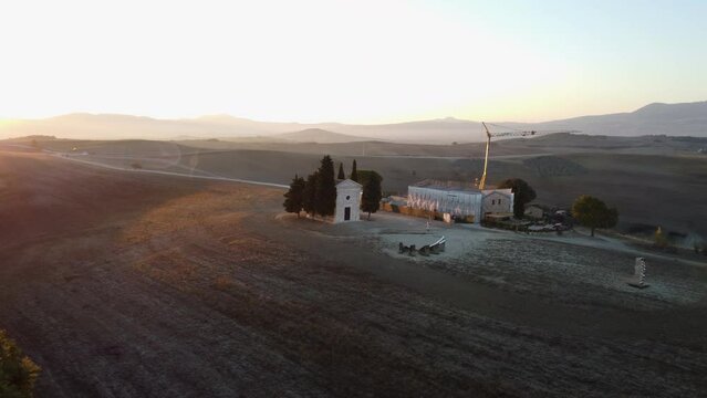 Chapel Cappella della Madonna di Vitaleta in val d'orcia aerial view, Tuscany Italy near San Quirico d'Orcia in autumn