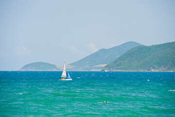 Sailing Boat in the Turquoise Water off Nha Trang Beach, Vietnam, Southeast Asia