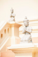 Small white Buddha statues at The Silver Pagoda, aka The Temple of the Emerald Buddha at The Royal...