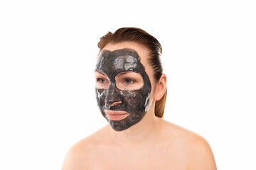 care for aging skin of a woman's face with a cosmetic mask