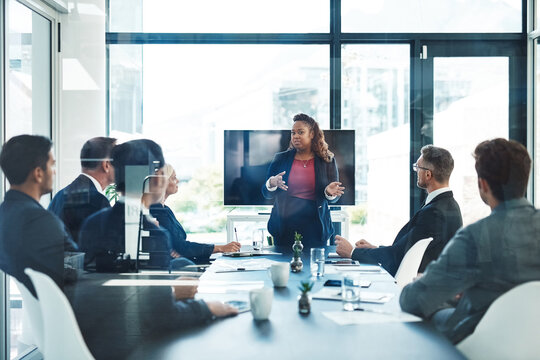 Lets pivot for a second. Cropped shot of an attractive young businesswoman giving a presentation in the boardroom.