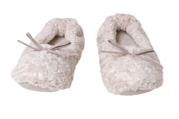 Slippers isolated. Close-up of a pair of female beige warm and soft cosy terry slippers isolated on white background.  Womans shoes.
