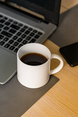 a cup of black coffee on the desktop coffee break.