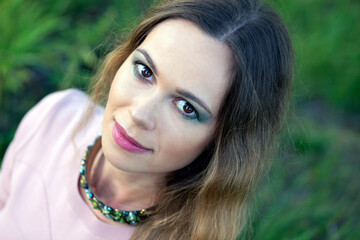 Portrait of a girl with a gentle spring make-up
