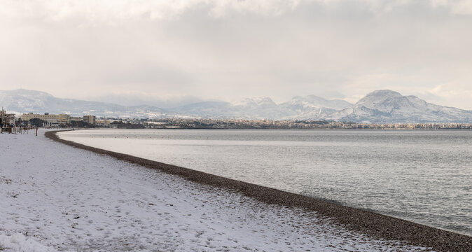 Snowy beach at Loutraki in Greece. A rare and beautiful phenomenon.
