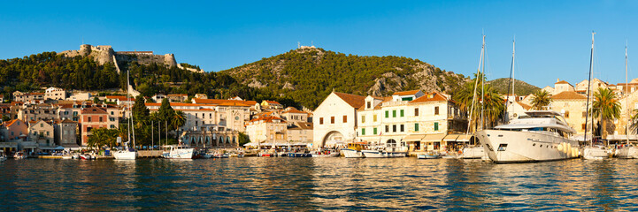 Fototapeta na wymiar Panoramic photo of Hvar Town, seen from the Mediterranean Sea, Hvar Island, Dalmatian Coast, Croatia