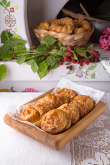 Placinda with potatoes, cottage cheese, cabbage, pumpkin. Fluffy, delicious pies. National Moldavian, Romanian, or Ukrainian cuisine. Traditional dishes in an authentic interior. © Екатерина