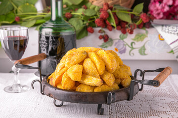 Homemade fried potato wedges. National Moldavian, Romanian, or Ukrainian cuisine. Traditional dishes in an authentic interior.