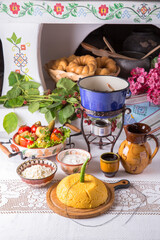 Corn porridge, polenta, hominy with pickles, cottage cheese, sour cream. National Moldavian,...
