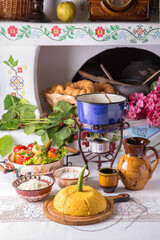 Corn porridge, polenta, hominy with pickles, cottage cheese, sour cream. National Moldavian,...