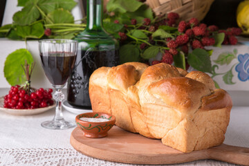 Homemade fragrant bread from the oven. National Moldavian, Romanian, or Ukrainian cuisine....
