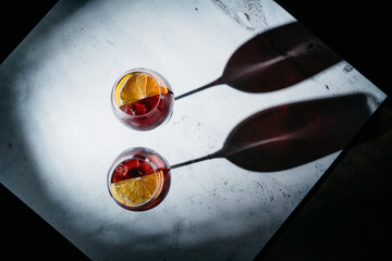 Top view bloody cocktails with oranges and ice