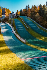 Beautiful alpine autumn or indian summer view at the famous Kaelberstein ski jump facilities near Berchtesgaden, Bavaria, Germany