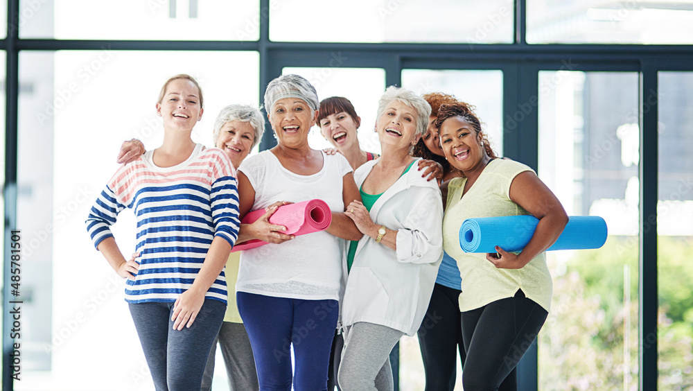 Canvas Prints Young and old...everyone should exercise. Shot of a group of women waiting for yoga class to begin.