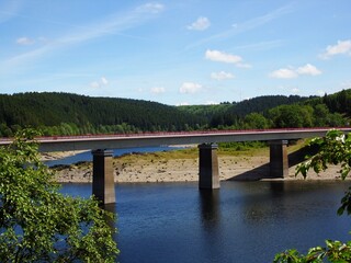 Big Lake bridge in front of Mountains 