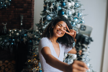 Woman Making Video Message or Selfie Concept of Holidays.