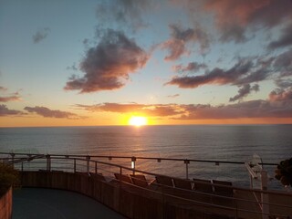 golden sunset and cloudy sky ,view from a cruise ship