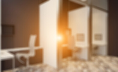 Modern office building interior. 3D rendering.. Sunset.. Abstract blur phototography.