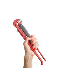 A plumbing wrench in a female hand isolated on a white background.