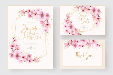 Fototapeta na wymiar watercolor cherry blossom wedding invitation card template