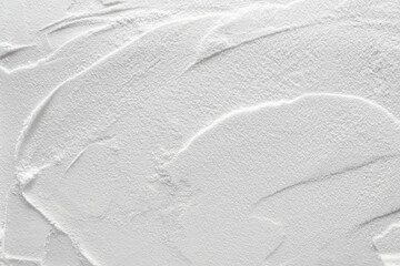 Artistic background, texture of sand and plaster. Color white