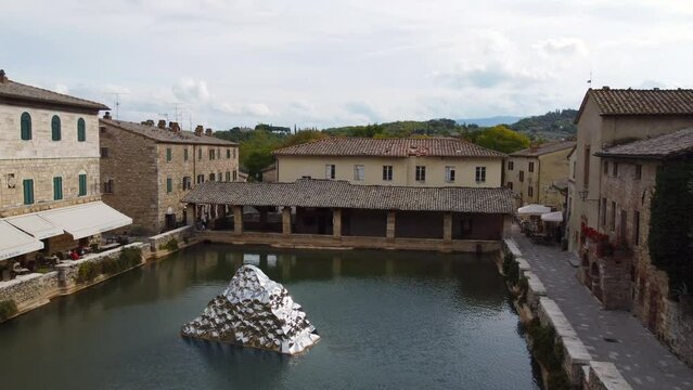 Bagno Vignoni thermal baths aerial view in Val d'Orcia, Tuscany Italy