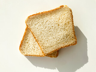 Sliced toast breads isolated on white background. Fresh bread for breakfast. Top view.