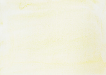Watercolor stroke and spray on white paper , Abstract background by hand drawn with yellow color liquid drip	