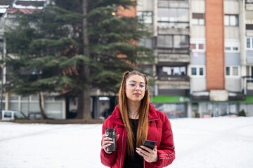 girl in her early twenties with a red jacket