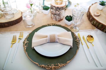 decorations made of wood and wildflowers served on the festive table