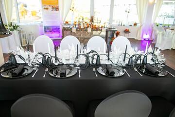 decorations made of wood and wildflowers served on the festive table