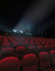 Empty red of seat and rows in cinema with projector lighting