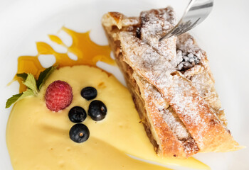 Apple strudel with vanilla cream