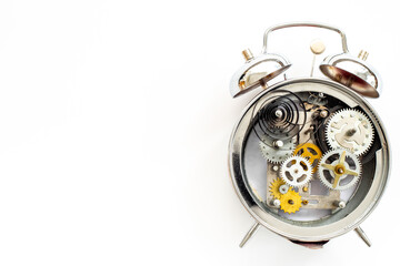 Fototapeta premium Watch mechanism with gears and wheels close up. Alarm clock mechanism