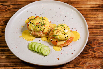 Breakfast is Egg benedict on plate