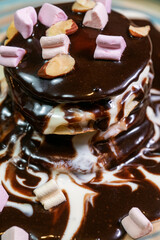 Pancake chocolate cake with nuts. High quality photo