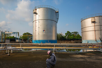 Top view Male inspection visual record pipeline on the tank.