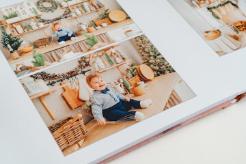 Photobook with photos of little boy photo shoot.