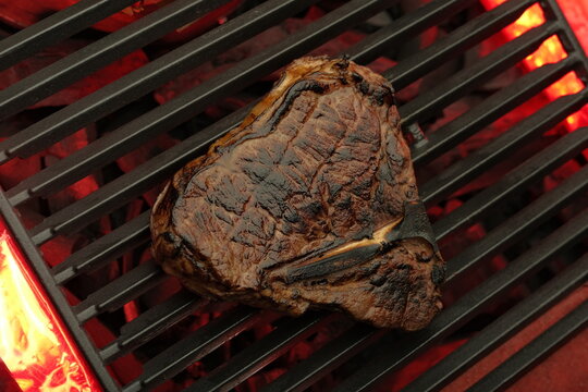 Grilled meat closeup food picture. Grilled juicy steak