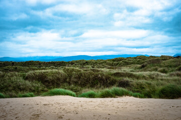 across the sand dunes