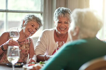 Spend your golden years with friends. Cropped shot of a group of senior female friends enjoying a...