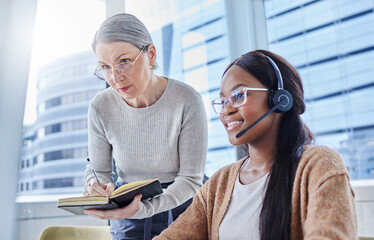 You work so fast its shocking. Shot of a young businesswoman going over some work with her manager.