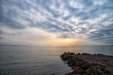 calmness at the seashore at sunset