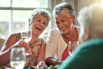 I remember those days. Cropped shot of a group of senior female friends enjoying a lunch date.