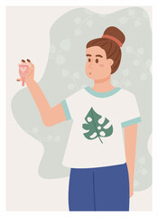 Confused girl with menstrual cup standing in the bathroom. Concept of lack of information about menstruation period. Importance of talking about it. Female hygiene and healthcare. Menstruation concept